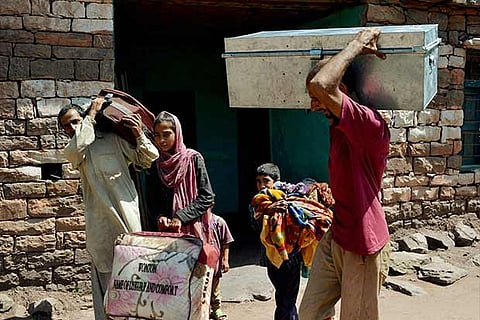 Villagers relocate after the heavy shelling