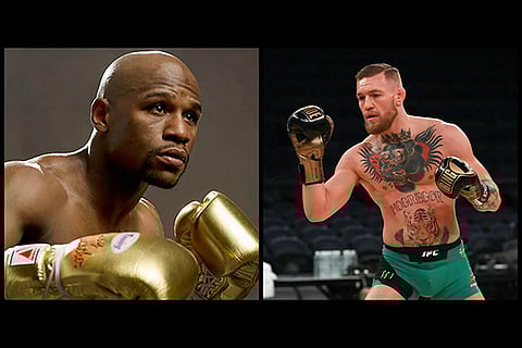 (L) American boxing champion Floyd Mayweather and (R) MMA champion Conor McGregor