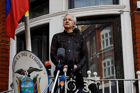 WikiLeaks founder Julian Assange is seen on the balcony of the Ecuadorian Embassy, London.(Reuters)