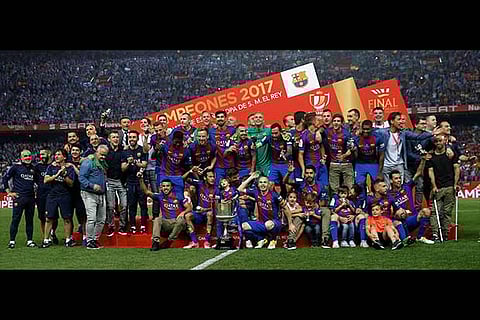Barcelona players celebrate their Copa del Rey title win