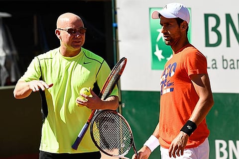 Serbia?s Novak Djokovic (right) with his new coach Andre Agassi