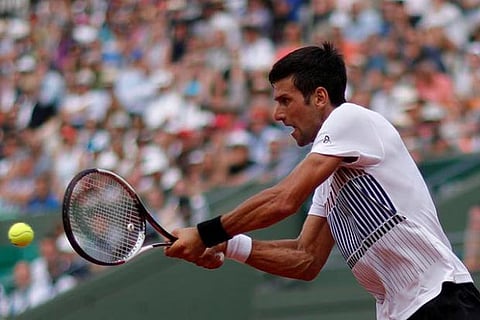 Novak Djokovic in action during his second round match against Joao Sousa