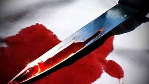 Image of a knife with bloodstains used for representational purposes only