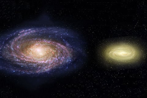 Concept art - Milky Way Galaxy alongside disk galaxy MACS2129-1