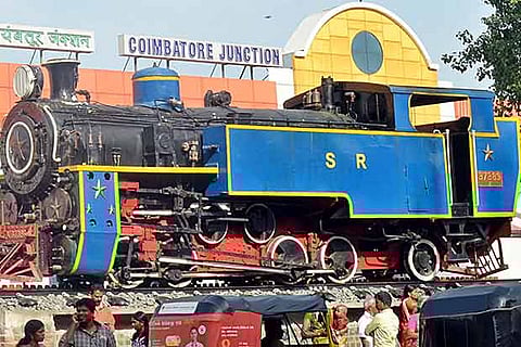 A 1925 model Swiss loco installed on a platform at the entrance of the Coimbatore railway station