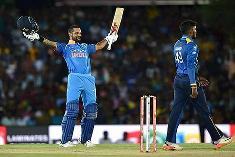 Shikhar Dhawan celebrates his century during the first ODI match against Sri Lanka