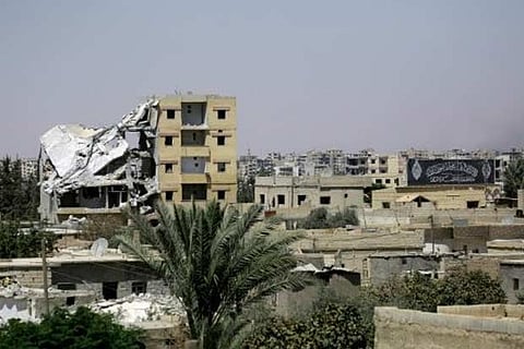 Damaged buildings in Raqa's western al-Darya neighbourhood