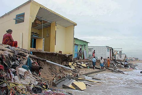 Houses damaged by sea water intrusion at Pattinapakkam