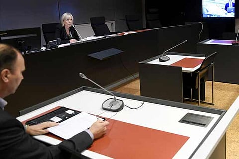 The hearing of main suspect Abderrahman Mechkah (attending the session from hospital via video)