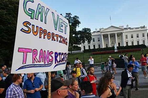 Protesters gather in front of the White House against Trump's transgender military ban