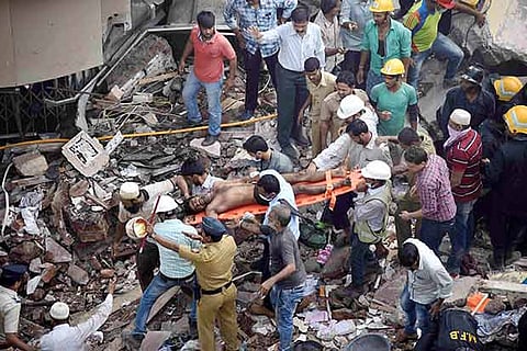Rescue work in progress after a five storey building collapsed in Mumbai