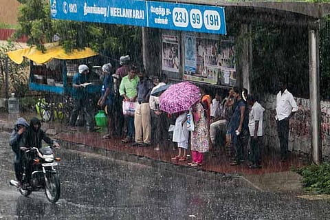 Office-goers and school students stuck as heavy rain lashed Chennai and suburbs on Friday morning