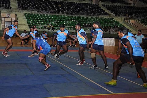 Action during Tamil Nadu versus Maharashtra in the All-India Postal Kabaddi tournament