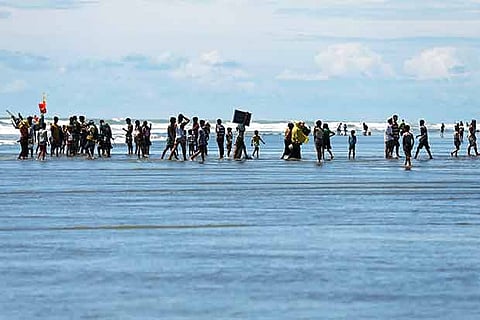 Rohingya refugees, who arrived after crossing Bangladesh-Myanmar border by boat through Bay of Benga