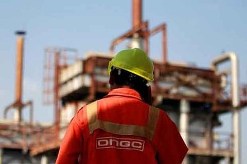 An ONGC technician in front of one of its plants.(Representative Photo | Reuters)