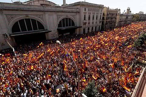 A pro-union demonstration makes its way through the streets of Barcelona, Spain