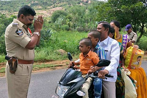 Abhishek Goyal, Deputy Commissioner of Police shared a picture of a family of five riding on a bike