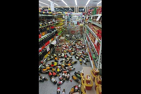 Products are seen on the floor of a store after a 5.4-magnitude earthquake
