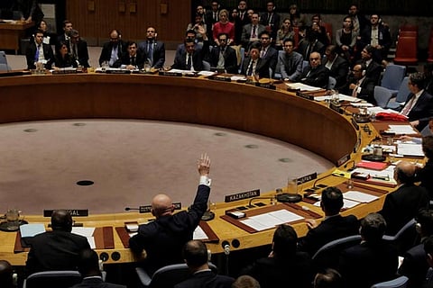Voting in the UN Security Council to renew an international inquiry into Syria chemical weapons