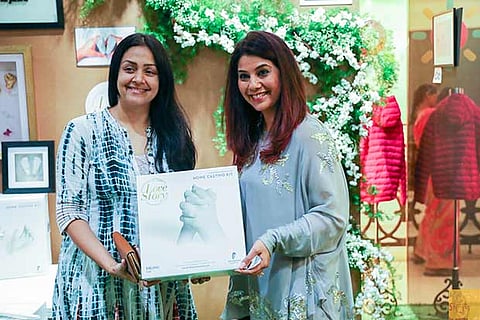 Actress Jyothika poses for a picture during the event