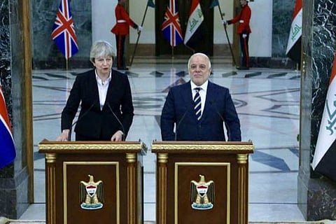Iraqi Prime Minister Haider al-Abadi receives U.K. Prime Minister Theresa May in Baghdad