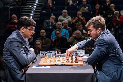 Viswanathan Anand plays Sergey Karjakin in the sixth round in the London Chess Classic