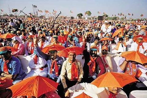 Thousands attend a rally ahead of the first phase of the Gujarat Assembly election