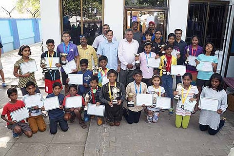 Winners and medallists of the state junior aquathlon with chief guest JM Fernando