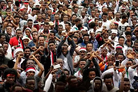 Demonstrators chant slogans in Bishoftu town, Oromia region, Ethiopia