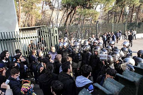 Iranian students scuffle with police at the University of Tehran