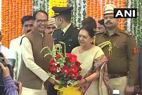 Madhya Pradesh Chief Minister Shivraj Singh Chouhan with governor Anandiben Patel
