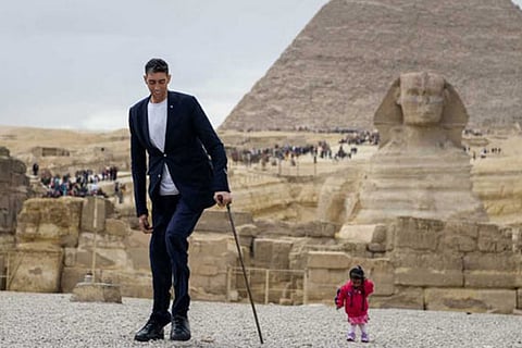 Sultan Kosen (L) and Jyoti Amge