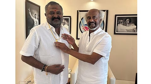 Rajinikanth gifts gold chain to Padayappa producer Thenappan