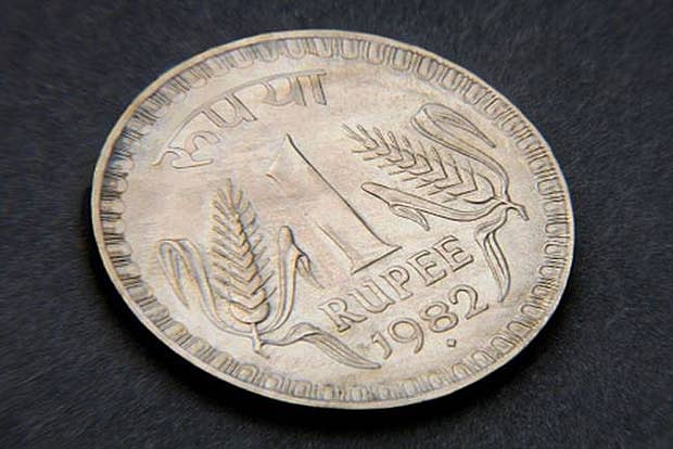 Rupee tumbles on capital flight, hits 3-month low of 65.04