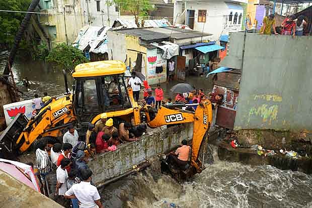 Rain hits normal life in twin districts, but festival spirit stays ...