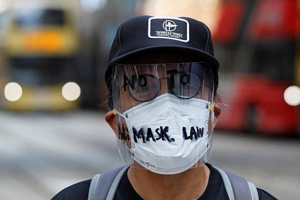 Hong Kong court lifts ban on face masks