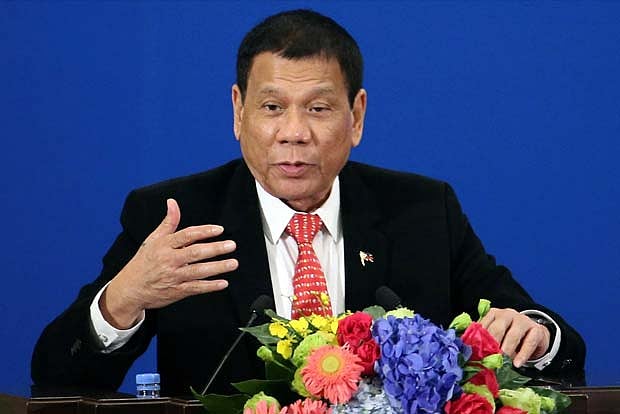 Philippine leader pardons US Marine in transgender killing