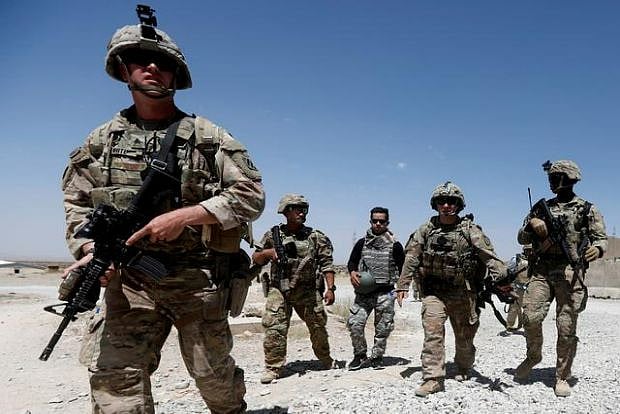 20 years, 2.3 trillion dollars spent, 2,400 troops killed: US' longest ...