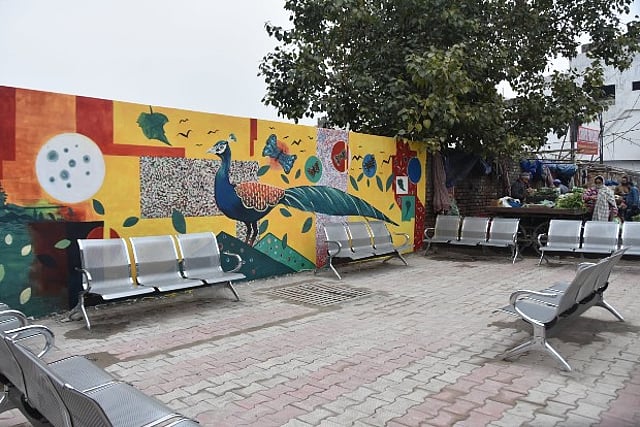 Garbage Point Transformation Garbage point aesthetically transformed with wall-painting, chairs in Jammu
