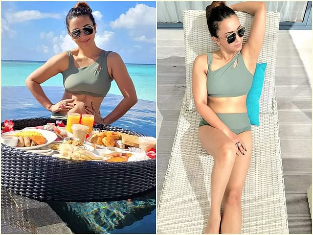 আরও একটি বিকিনি লুক জনপ্রিয় হয়েছে। সবুজের এই বিশেষ শেডের বিকিনিটি সত্যিই অসাধারণ। আর কৌশানিও খুব সুন্দরভাবে ক্যারি করেছেন এই পোশাক। তাঁকে দেখে চোখ ফেরানোর উপায় নেই।বেনারসি শাড়ি কেনার সময় ঠকবেন না! নকল না আসল চিনে নিন এই সহজ উপায়ে, জানুন