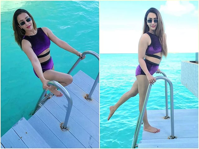 একটি ভায়োলেট রঙের বিকিনি পরেছিলেন কৌশানি। খুবই সুন্দর দেখাচ্ছিল তাঁকে। তাঁর টু-পার্ট এই আউটফিটটি মেজর ফ্যাশন গোলস সেট করতে পারে। বিকিনির উপরের অংশের কাট আউট স্লিভ ডিটেলিং ছিল।সবুজ ব্যাকলেস গাউনে মৌনী রায়ের কিলার পোজ! নতুন লুক দেখে হুঁশ উড়ল ফ্যানদের