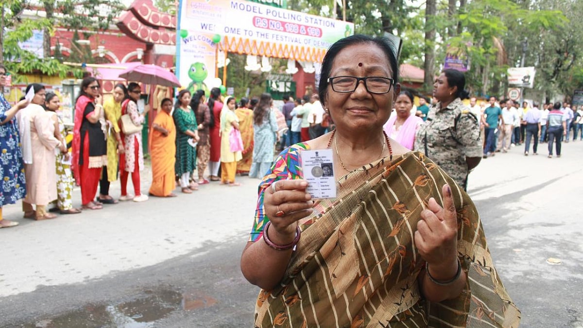 Old lady showing her voting card 