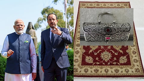 PM Modi Gifts Silver Clutch Purse to First Lady of Cyprus Philippa Karsera