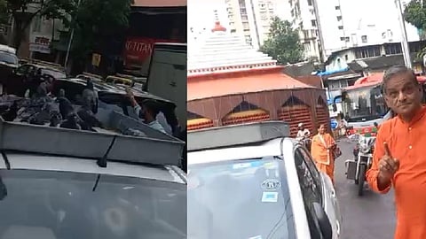 Man Places Tray on Car Roof to Feed Pigeons Near Dadar Kabutar Khana
