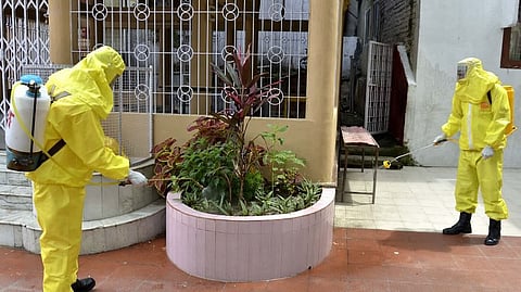 NDRF, Guwahati conducts sanitization drive at temples to prevent the spread of COVID-19