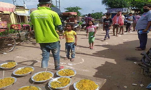 NGO Volunteers feeds people at Jorhat town