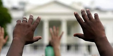 White House on lockdown as protests over black man death reach Washington