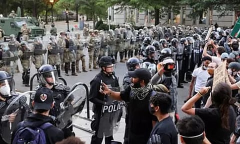 US President Donald Trump deploys 'heavily-armed soldiers'