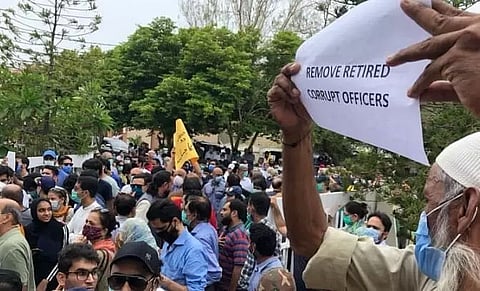 Karachi residents protest against water-logged, roads, power outage