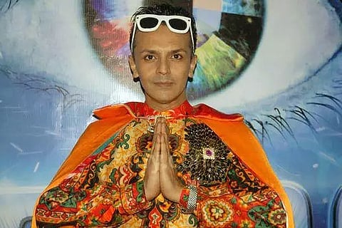 Imam Siddiqui taking off all his clothes